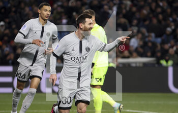 2023-02-01 - Lionel Messi of PSG celebrates his goal with Hugo Ekitike (left) during the French championship Ligue 1 football match between Montpellier HSC and Paris Saint-Germain on February 1, 2023 at La Mosson-Mondial 98 stadium in Montpellier, France - FOOTBALL - FRENCH CHAMP - MONTPELLIER V PARIS SG - FRENCH LIGUE 1 - SOCCER
