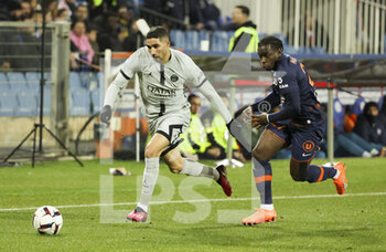 2023-02-02 - Achraf Hakimi of PSG, Faitout Maouassa of Montpellier during the French championship Ligue 1 football match between Montpellier HSC and Paris Saint-Germain on February 1, 2023 at La Mosson-Mondial 98 stadium in Montpellier, France - FOOTBALL - FRENCH CHAMP - MONTPELLIER V PARIS SG - FRENCH LIGUE 1 - SOCCER