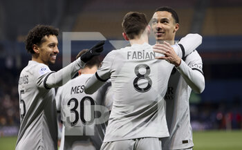 2023-02-02 - Fabian Ruiz Pena of PSG celebrates his goal with Marquinhos, Hugo Ekitike of PSG during the French championship Ligue 1 football match between Montpellier HSC and Paris Saint-Germain on February 1, 2023 at La Mosson-Mondial 98 stadium in Montpellier, France - FOOTBALL - FRENCH CHAMP - MONTPELLIER V PARIS SG - FRENCH LIGUE 1 - SOCCER