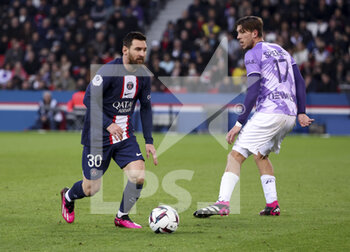 2023-02-04 - Lionel Messi of PSG, Stijn Spierings of Toulouse during the French championship Ligue 1 football match between Paris Saint-Germain (PSG) and Toulouse FC (TFC, Tefece) on February 4, 2023 at Parc des Princes stadium in Paris, France - FOOTBALL - FRENCH CHAMP - PARIS SG V TOULOUSE - FRENCH LIGUE 1 - SOCCER