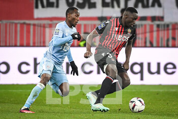 2023-02-10 - Cyrille BAYALA of Ajaccio and Antoine MENDY of Nice during the French championship Ligue 1 football match between OGC Nice and AC Ajaccio on February 10, 2023 at Allianz Riviera stadium in Nice, France - FOOTBALL - FRENCH CHAMP - NICE V AJACCIO - FRENCH LIGUE 1 - SOCCER