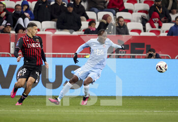 2023-02-10 - Cyrille Bayala of Ajaccio, Badredine Bouanani of Nice (left) during the French championship Ligue 1 football match between OGC Nice (OGCN) and AC Ajaccio (ACA) on February 10, 2023 at Allianz Riviera stadium in Nice, France - FOOTBALL - FRENCH CHAMP - NICE V AJACCIO - FRENCH LIGUE 1 - SOCCER