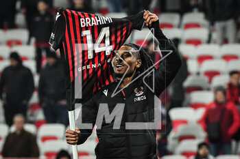 2023-02-10 - Khephren THURAM of Nice celebrate the victory with the jersey of Billal BRAHIMI of Nice during the French championship Ligue 1 football match between OGC Nice and AC Ajaccio on February 10, 2023 at Allianz Riviera stadium in Nice, France - FOOTBALL - FRENCH CHAMP - NICE V AJACCIO - FRENCH LIGUE 1 - SOCCER
