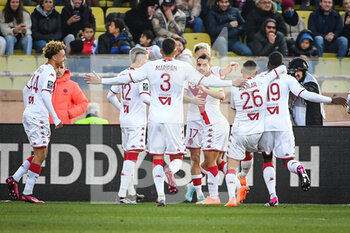 2023-02-11 - Aleksandr GOLOVIN of Monaco celebrate his goal with teammates during the French championship Ligue 1 football match between AS Monaco and Paris Saint-Germain on February 11, 2023 at Louis II stadium in Monaco - FOOTBALL - FRENCH CHAMP - MONACO V PARIS SG - FRENCH LIGUE 1 - SOCCER