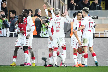 2023-02-11 - Wissam BEN YEDDER of Monaco celebrate his goal with teammates during the French championship Ligue 1 football match between AS Monaco and Paris Saint-Germain on February 11, 2023 at Louis II stadium in Monaco - FOOTBALL - FRENCH CHAMP - MONACO V PARIS SG - FRENCH LIGUE 1 - SOCCER