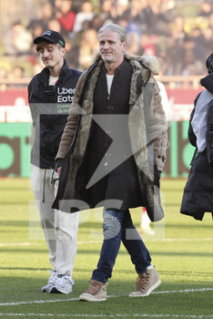 2023-02-11 - Emmanuel Petit kicks off the French championship Ligue 1 football match between AS Monaco (ASM) and Paris Saint-Germain (PSG) on February 11, 2023 at Stade Louis II in Monaco - FOOTBALL - FRENCH CHAMP - MONACO V PARIS SG - FRENCH LIGUE 1 - SOCCER