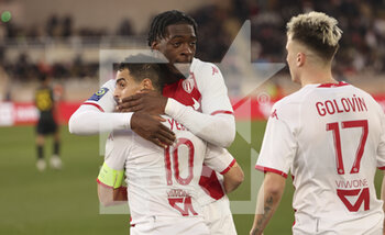 2023-02-11 - Wissam Ben Yedder of Monaco celebrates his second goal with Axel Disasi during the French championship Ligue 1 football match between AS Monaco (ASM) and Paris Saint-Germain (PSG) on February 11, 2023 at Stade Louis II in Monaco - FOOTBALL - FRENCH CHAMP - MONACO V PARIS SG - FRENCH LIGUE 1 - SOCCER