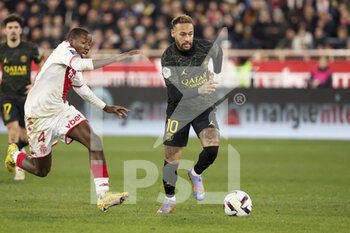 2023-02-11 - Neymar Jr of PSG, Mohamed Camara of Monaco (left) during the French championship Ligue 1 football match between AS Monaco (ASM) and Paris Saint-Germain (PSG) on February 11, 2023 at Stade Louis II in Monaco - FOOTBALL - FRENCH CHAMP - MONACO V PARIS SG - FRENCH LIGUE 1 - SOCCER