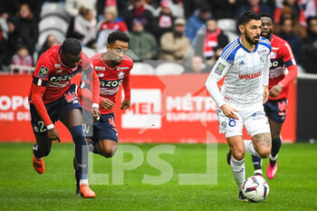 2023-02-12 - Timothy WEAH of Lille, Angel GOMES of Lille and Morgan SANSON of Strasbourg during the French championship Ligue 1 football match between Losc Lille and RC Strasbourg on February 12, 2023 at Pierre Mauroy stadium in Villeneuve-d'Ascq near Lille, France - FOOTBALL - FRENCH CHAMP - LILLE V STRASBOURG - FRENCH LIGUE 1 - SOCCER