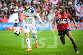 2023-02-12 - Kevin GAMEIRO of Strasbourg and Tiago DJALO of Lille during the French championship Ligue 1 football match between Losc Lille and RC Strasbourg on February 12, 2023 at Pierre Mauroy stadium in Villeneuve-d'Ascq near Lille, France - FOOTBALL - FRENCH CHAMP - LILLE V STRASBOURG - FRENCH LIGUE 1 - SOCCER