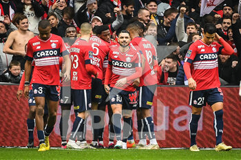 2023-02-12 - Jonathan DAVID of Lille celebrate his goal with teammates during the French championship Ligue 1 football match between Losc Lille and RC Strasbourg on February 12, 2023 at Pierre Mauroy stadium in Villeneuve-d'Ascq near Lille, France - FOOTBALL - FRENCH CHAMP - LILLE V STRASBOURG - FRENCH LIGUE 1 - SOCCER