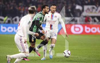 2023-02-12 - Angelo Fulgini of Lens, Corentin Tolisso of Lyon during the French championship Ligue 1 football match between Olympique Lyonnais (OL) and RC Lens (RCL) on February 12, 2023 at Groupama stadium in Decines-Charpieu near Lyon, France - FOOTBALL - FRENCH CHAMP - LYON V LENS - FRENCH LIGUE 1 - SOCCER