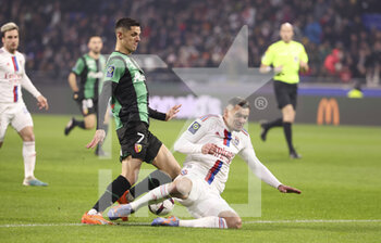 2023-02-12 - Florian Sotoca of Lens, Dejan Lovren of Lyon during the French championship Ligue 1 football match between Olympique Lyonnais (OL) and RC Lens (RCL) on February 12, 2023 at Groupama stadium in Decines-Charpieu near Lyon, France - FOOTBALL - FRENCH CHAMP - LYON V LENS - FRENCH LIGUE 1 - SOCCER
