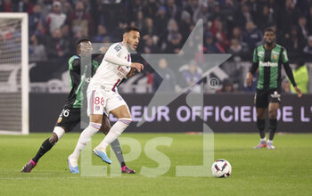 2023-02-12 - Corentin Tolisso of Lyon, Salis Abdul Samed of Lens (left) during the French championship Ligue 1 football match between Olympique Lyonnais (OL) and RC Lens (RCL) on February 12, 2023 at Groupama stadium in Decines-Charpieu near Lyon, France - FOOTBALL - FRENCH CHAMP - LYON V LENS - FRENCH LIGUE 1 - SOCCER