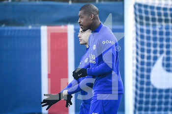 2023-02-13 - Ismael GHARBI of PSG and Presnel KIMPEMBE of PSG during the training of the Paris Saint-Germain team on February 13, 2023 at Camp des Loges in Saint-Germain-en-Laye near Paris, France - FOOTBALL - PARIS SG TRAINING AND PRESS CONFERENCE - FRENCH LIGUE 1 - SOCCER