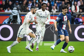 2023-02-19 - Remy CABELLA of Lille, Jonathan DAVID of Lille and Vitor MACHADO FERREIRA (Vitinha) of PSG during the French championship Ligue 1 football match between Paris Saint-Germain and LOSC Lille on February 19, 2023 at Parc des Princes stadium in Paris, France - FOOTBALL - FRENCH CHAMP - PARIS SG V LILLE - FRENCH LIGUE 1 - SOCCER