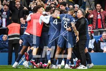 2023-02-19 - Lionel (Leo) MESSI of PSG celebrate his goal with teammates and Christophe GALTIER of PSG during the French championship Ligue 1 football match between Paris Saint-Germain and LOSC Lille on February 19, 2023 at Parc des Princes stadium in Paris, France - FOOTBALL - FRENCH CHAMP - PARIS SG V LILLE - FRENCH LIGUE 1 - SOCCER
