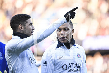 2023-02-24 - Achraf Hakimi and Kylian Mbappe during the public training of the Paris Saint-Germain (PSG) football team on February 24, 2023 at the Parc des Princes stadium in Paris, France - FOOTBALL - TRAINING OF THE PARIS SG TEAM - FRENCH LIGUE 1 - SOCCER