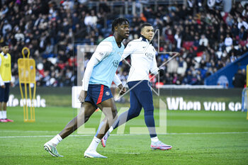 2023-02-24 - Timothee Pembele and Kylian Mbappe during the public training of the Paris Saint-Germain (PSG) football team on February 24, 2023 at the Parc des Princes stadium in Paris, France - FOOTBALL - TRAINING OF THE PARIS SG TEAM - FRENCH LIGUE 1 - SOCCER