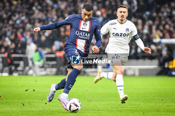 2023-02-26 - Kylian MBAPPE of PSG and Valentin RONGIER of Marseille during the French championship Ligue 1 football match between Olympique de Marseille and Paris Saint-Germain on February 26, 2023 at Velodrome stadium in Marseille, France - FOOTBALL - FRENCH CHAMP - MARSEILLE V PARIS SG - FRENCH LIGUE 1 - SOCCER