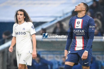 2023-02-26 - Matteo GUENDOUZI of Marseille and Kylian MBAPPE of PSG during the French championship Ligue 1 football match between Olympique de Marseille and Paris Saint-Germain on February 26, 2023 at Velodrome stadium in Marseille, France - FOOTBALL - FRENCH CHAMP - MARSEILLE V PARIS SG - FRENCH LIGUE 1 - SOCCER