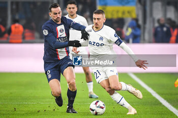 2023-02-26 - Fabian RUIZ of PSG and Valentin RONGIER of Marseille during the French championship Ligue 1 football match between Olympique de Marseille and Paris Saint-Germain on February 26, 2023 at Velodrome stadium in Marseille, France - FOOTBALL - FRENCH CHAMP - MARSEILLE V PARIS SG - FRENCH LIGUE 1 - SOCCER