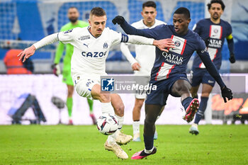 2023-02-26 - Valentin RONGIER of Marseille and Nuno MENDES of PSG during the French championship Ligue 1 football match between Olympique de Marseille and Paris Saint-Germain on February 26, 2023 at Velodrome stadium in Marseille, France - FOOTBALL - FRENCH CHAMP - MARSEILLE V PARIS SG - FRENCH LIGUE 1 - SOCCER