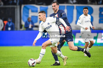2023-02-26 - Valentin RONGIER of Marseille and Fabian RUIZ of PSG during the French championship Ligue 1 football match between Olympique de Marseille and Paris Saint-Germain on February 26, 2023 at Velodrome stadium in Marseille, France - FOOTBALL - FRENCH CHAMP - MARSEILLE V PARIS SG - FRENCH LIGUE 1 - SOCCER