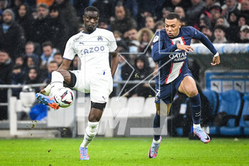 2023-02-26 - Eric BAILLY of Marseille and Kylian MBAPPE of PSG during the French championship Ligue 1 football match between Olympique de Marseille and Paris Saint-Germain on February 26, 2023 at Velodrome stadium in Marseille, France - FOOTBALL - FRENCH CHAMP - MARSEILLE V PARIS SG - FRENCH LIGUE 1 - SOCCER
