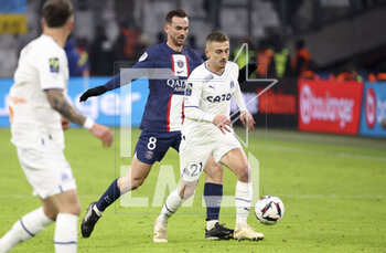 2023-02-26 - Valentin Rongier of Marseille, Fabian Ruiz Pena of PSG (left) during the French championship Ligue 1 football match between Olympique de Marseille (OM) and Paris Saint-Germain (PSG) on February 26, 2023 at Stade Velodrome in Marseille, France - FOOTBALL - FRENCH CHAMP - MARSEILLE V PARIS SG - FRENCH LIGUE 1 - SOCCER