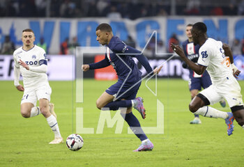 2023-02-26 - Kylian Mbappe of PSG, Valentin Rongier of Marseille (left) during the French championship Ligue 1 football match between Olympique de Marseille (OM) and Paris Saint-Germain (PSG) on February 26, 2023 at Stade Velodrome in Marseille, France - FOOTBALL - FRENCH CHAMP - MARSEILLE V PARIS SG - FRENCH LIGUE 1 - SOCCER