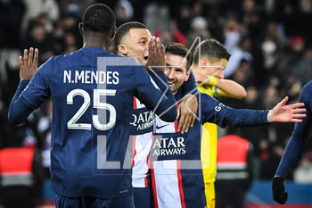 2023-03-04 - Lionel (Leo) MESSI of PSG celebrate his goal with Kylian MBAPPE of PSG and Nuno MENDES of PSG during the French championship Ligue 1 football match between Paris Saint-Germain and FC Nantes on March 4, 2023 at Parc des Princes stadium in Paris, France - FOOTBALL - FRENCH CHAMP - PARIS SG V NANTES - FRENCH LIGUE 1 - SOCCER