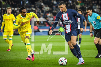 2023-03-04 - Samuel MOUTOUSSAMY of Nantes and Kylian MBAPPE of PSG during the French championship Ligue 1 football match between Paris Saint-Germain and FC Nantes on March 4, 2023 at Parc des Princes stadium in Paris, France - FOOTBALL - FRENCH CHAMP - PARIS SG V NANTES - FRENCH LIGUE 1 - SOCCER