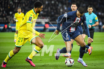 2023-03-04 - Jean-Charles CASTELLETTO of Nantes and Kylian MBAPPE of PSG during the French championship Ligue 1 football match between Paris Saint-Germain and FC Nantes on March 4, 2023 at Parc des Princes stadium in Paris, France - FOOTBALL - FRENCH CHAMP - PARIS SG V NANTES - FRENCH LIGUE 1 - SOCCER
