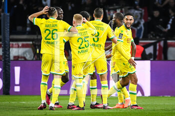 2023-03-04 - Ignatius GANAGO of Nantes celebrate his goal with teammates during the French championship Ligue 1 football match between Paris Saint-Germain and FC Nantes on March 4, 2023 at Parc des Princes stadium in Paris, France - FOOTBALL - FRENCH CHAMP - PARIS SG V NANTES - FRENCH LIGUE 1 - SOCCER