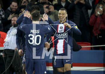 2023-03-04 - Kylian Mbappe of PSG celebrates his 201st goal for PSG with Lionel Messi (left) during the French championship Ligue 1 football match between Paris Saint-Germain (PSG) and FC Nantes (FCN) on March 4, 2023 at Parc des Princes stadium in Paris, France - FOOTBALL - FRENCH CHAMP - PARIS SG V NANTES - FRENCH LIGUE 1 - SOCCER