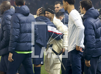 2023-03-05 - Kylian Mbappe of PSG is congratulated by Neymar Jr after receiving a trophy celebrating his 201st goal for PSG, becoming the club's top scorer, during a ceremony following the French championship Ligue 1 football match between Paris Saint-Germain (PSG) and FC Nantes (FCN) on March 4, 2023 at Parc des Princes stadium in Paris, France - FOOTBALL - FRENCH CHAMP - PARIS SG V NANTES - FRENCH LIGUE 1 - SOCCER
