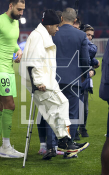 2023-03-05 - Neymar Jr on crutches celebrates Kylian Mbappe of PSG receiving a trophy celebrating his 201st goal for PSG, becoming the club's top scorer, during a ceremony following the French championship Ligue 1 football match between Paris Saint-Germain (PSG) and FC Nantes (FCN) on March 4, 2023 at Parc des Princes stadium in Paris, France - FOOTBALL - FRENCH CHAMP - PARIS SG V NANTES - FRENCH LIGUE 1 - SOCCER