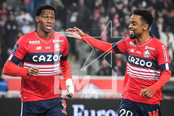 2023-03-10 - Jonathan DAVID of Lille celebrate his goal with Angel GOMES of Lille during the French championship Ligue 1 football match between LOSC Lille and Olympique Lyonnais (Lyon) on March 10, 2023 at Pierre Mauroy stadium in Villeneuve-d'Ascq near Lille, France - FOOTBALL - FRENCH CHAMP - LILLE V LYON - FRENCH LIGUE 1 - SOCCER