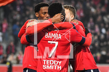 2023-03-10 - Jonathan DAVID of Lille celebrate his goal with teammates during the French championship Ligue 1 football match between LOSC Lille and Olympique Lyonnais (Lyon) on March 10, 2023 at Pierre Mauroy stadium in Villeneuve-d'Ascq near Lille, France - FOOTBALL - FRENCH CHAMP - LILLE V LYON - FRENCH LIGUE 1 - SOCCER