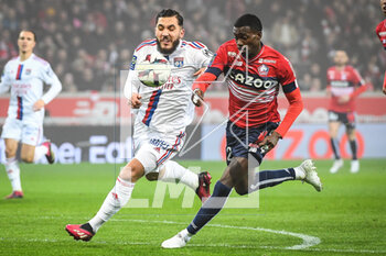 2023-03-10 - Rayan CHERKI of Lyon and Timothy WEAH of Lille during the French championship Ligue 1 football match between LOSC Lille and Olympique Lyonnais (Lyon) on March 10, 2023 at Pierre Mauroy stadium in Villeneuve-d'Ascq near Lille, France - FOOTBALL - FRENCH CHAMP - LILLE V LYON - FRENCH LIGUE 1 - SOCCER