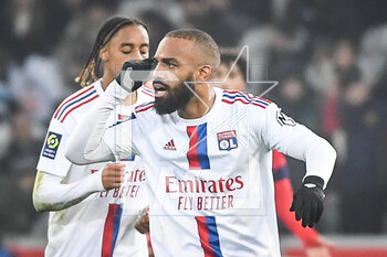 2023-03-10 - Alexandre LACAZETTE of Lyon celebrates hig goal during the French championship Ligue 1 football match between LOSC Lille and Olympique Lyonnais (Lyon) on March 10, 2023 at Pierre Mauroy stadium in Villeneuve-d'Ascq near Lille, France - FOOTBALL - FRENCH CHAMP - LILLE V LYON - FRENCH LIGUE 1 - SOCCER
