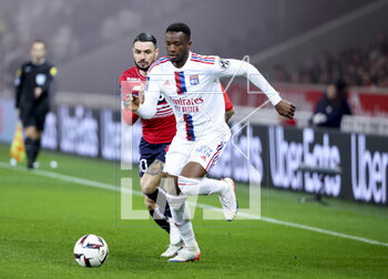 2023-03-10 - Sinaly Diomande of Lyon, Remy Cabella of Lille (left) during the French championship Ligue 1 football match between Losc Lille and Olympique Lyonnais (Lyon) on March 10, 2023 at Pierre Mauroy stadium in Villeneuve-d'Ascq near Lille, France - FOOTBALL - FRENCH CHAMP - LILLE V LYON - FRENCH LIGUE 1 - SOCCER