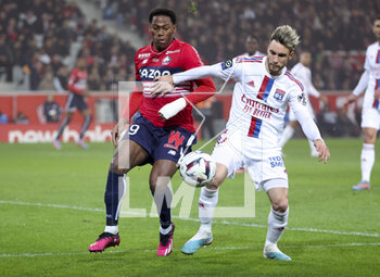 2023-03-10 - Jonathan David of Lille, Nicolas Tagliafico of Lyon during the French championship Ligue 1 football match between Losc Lille and Olympique Lyonnais (Lyon) on March 10, 2023 at Pierre Mauroy stadium in Villeneuve-d'Ascq near Lille, France - FOOTBALL - FRENCH CHAMP - LILLE V LYON - FRENCH LIGUE 1 - SOCCER