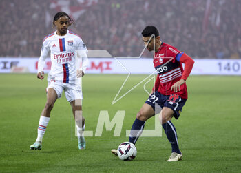 2023-03-10 - Benjamin Andre of Lille, Bradley Barcola of Lyon (left) during the French championship Ligue 1 football match between Losc Lille and Olympique Lyonnais (Lyon) on March 10, 2023 at Pierre Mauroy stadium in Villeneuve-d'Ascq near Lille, France - FOOTBALL - FRENCH CHAMP - LILLE V LYON - FRENCH LIGUE 1 - SOCCER