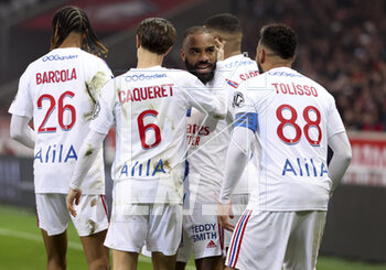 2023-03-10 - Alexandre Lacazette of Lyon celebrates his goal with teammates during the French championship Ligue 1 football match between Losc Lille and Olympique Lyonnais (Lyon) on March 10, 2023 at Pierre Mauroy stadium in Villeneuve-d'Ascq near Lille, France - FOOTBALL - FRENCH CHAMP - LILLE V LYON - FRENCH LIGUE 1 - SOCCER