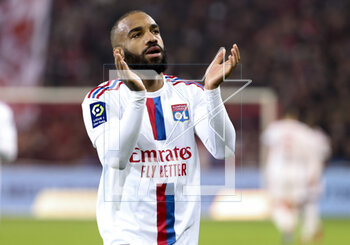 2023-03-10 - Alexandre Lacazette of Lyon salutes the supporters of Lyon following the French championship Ligue 1 football match between Losc Lille and Olympique Lyonnais (Lyon) on March 10, 2023 at Pierre Mauroy stadium in Villeneuve-d'Ascq near Lille, France - FOOTBALL - FRENCH CHAMP - LILLE V LYON - FRENCH LIGUE 1 - SOCCER