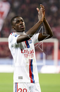 2023-03-10 - Sael Kumbedi Nseke of Lyon salutes the supporters of Lyon following the French championship Ligue 1 football match between Losc Lille and Olympique Lyonnais (Lyon) on March 10, 2023 at Pierre Mauroy stadium in Villeneuve-d'Ascq near Lille, France - FOOTBALL - FRENCH CHAMP - LILLE V LYON - FRENCH LIGUE 1 - SOCCER