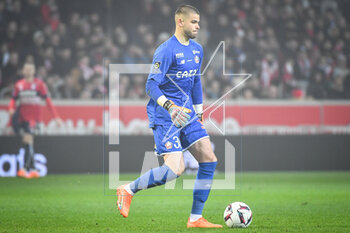 2023-03-10 - Lucas CHEVALLIER of Lille during the French championship Ligue 1 football match between LOSC Lille and Olympique Lyonnais (Lyon) on March 10, 2023 at Pierre Mauroy stadium in Villeneuve-d'Ascq near Lille, France - FOOTBALL - FRENCH CHAMP - LILLE V LYON - FRENCH LIGUE 1 - SOCCER