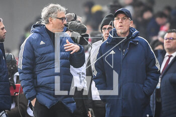 2023-03-10 - Laurent BLANC of Lyon and Philippe LAMBERT of Lyon during the French championship Ligue 1 football match between LOSC Lille and Olympique Lyonnais (Lyon) on March 10, 2023 at Pierre Mauroy stadium in Villeneuve-d'Ascq near Lille, France - FOOTBALL - FRENCH CHAMP - LILLE V LYON - FRENCH LIGUE 1 - SOCCER